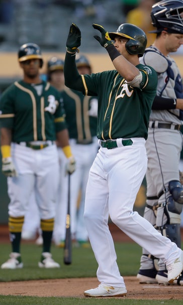 A's beat Tigers 7-3 in game resumed nearly 4 months later